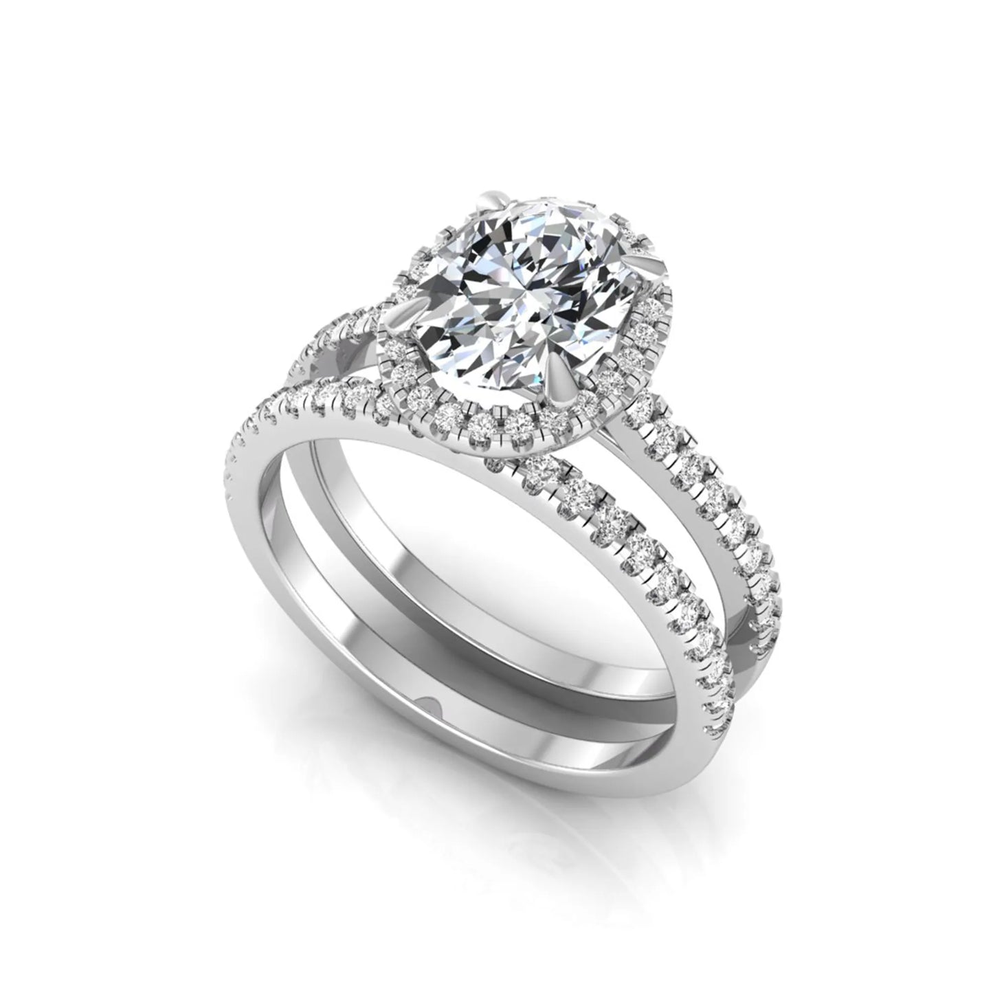 Oval cut lab grown diamond bridal ring set featuring an IGI certified center diamond with a round diamond halo and matching pavé wedding band in white gold