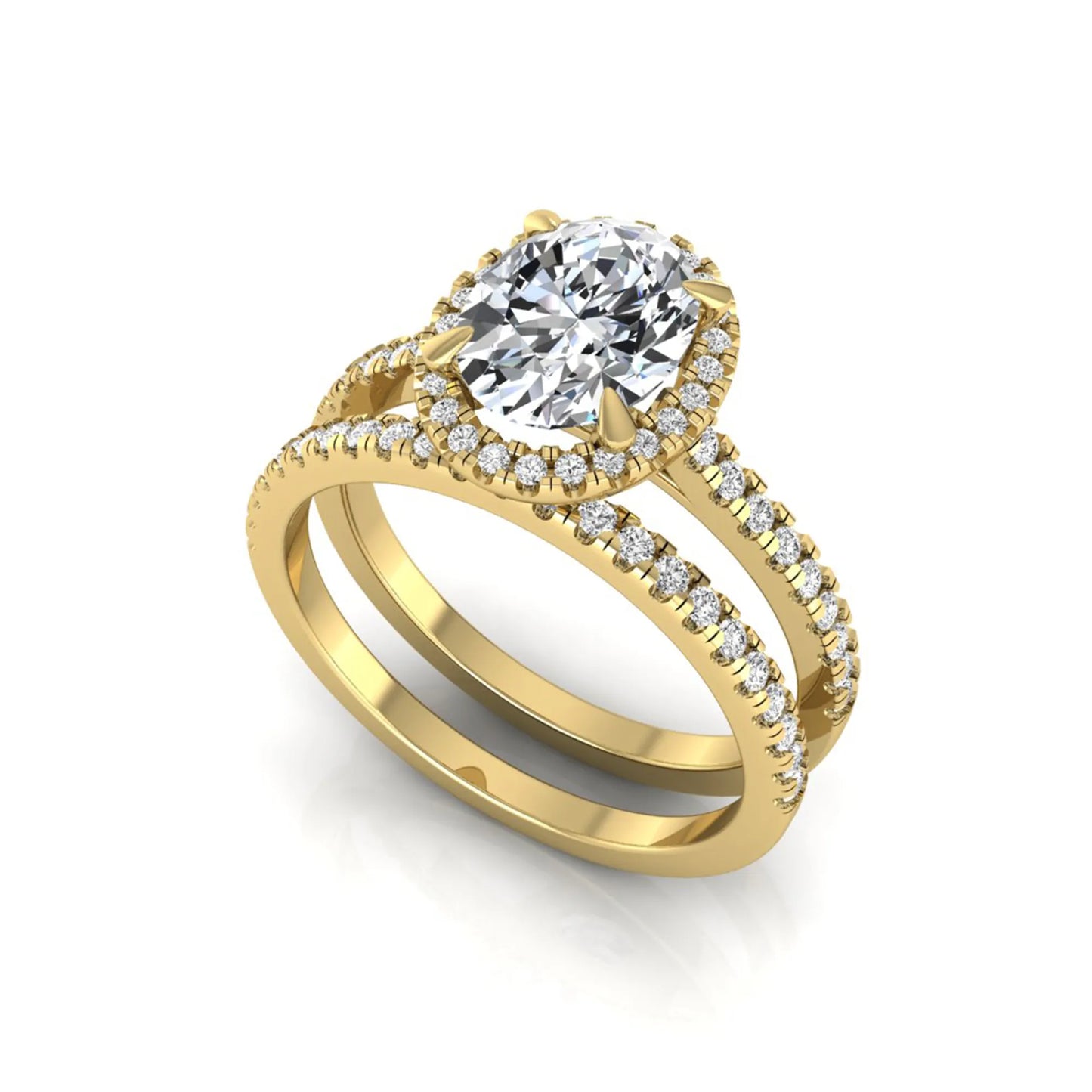 Oval cut lab grown diamond bridal ring set featuring an IGI certified center diamond with a round diamond halo and matching pavé wedding band in yellow gold