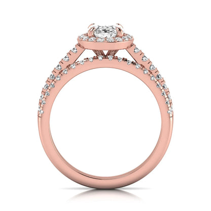 Oval halo lab grown diamond bridal ring set featuring an IGI certified oval cut center diamond with round pavé diamonds in a classic halo setting and matching wedding band in rose gold