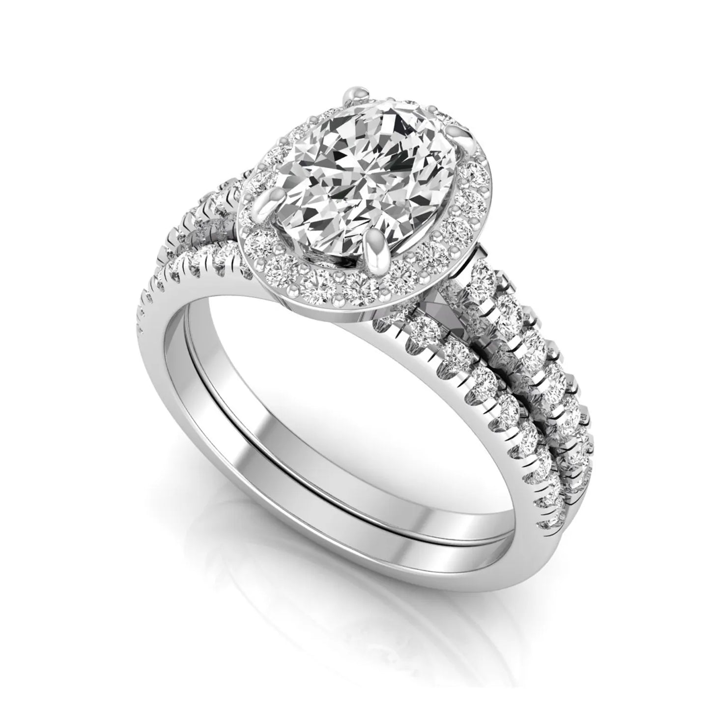 Oval halo lab grown diamond bridal ring set featuring an IGI certified oval cut center diamond with round pavé diamonds in a classic halo setting and matching wedding band in white gold