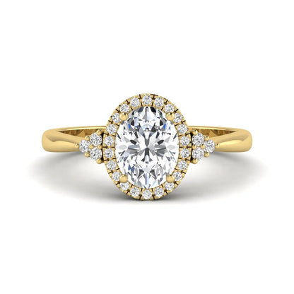 IGI Certified 1.86 carat oval cut lab grown diamond halo engagement ring with round diamond accent shoulders in yellow gold.