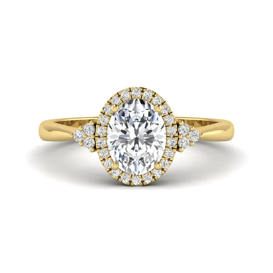 IGI Certified 1.86 carat oval cut lab grown diamond halo engagement ring with round diamond accent shoulders in yellow gold.