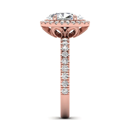 Oval cut lab grown diamond halo engagement ring with pavé round diamonds in a rose gold setting