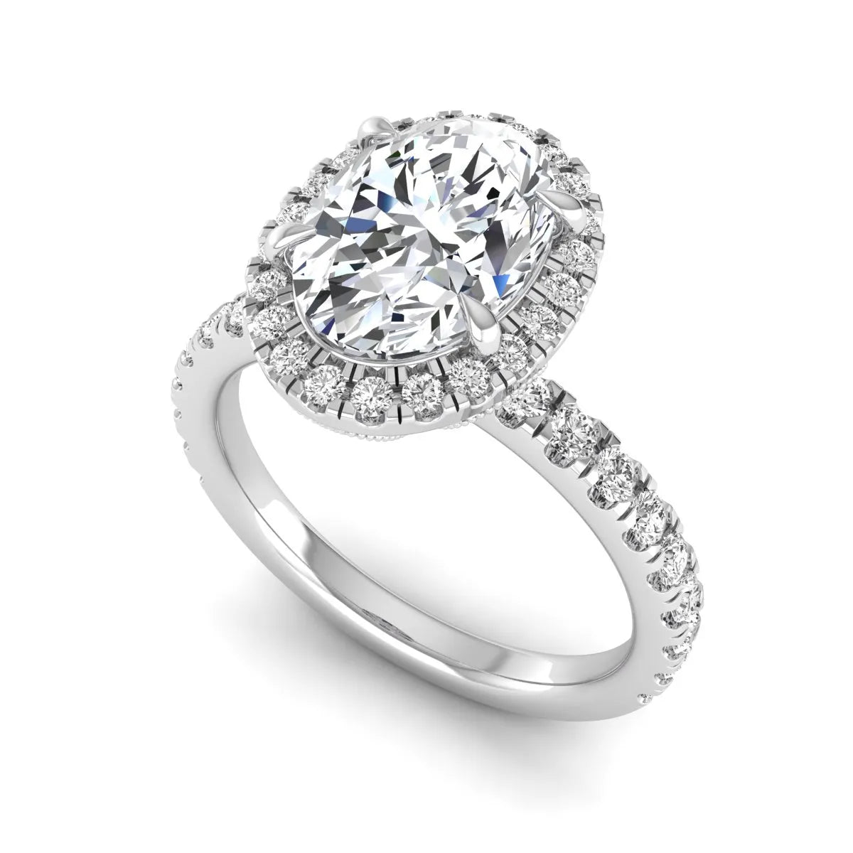 Oval cut lab grown diamond halo engagement ring with pavé round diamonds in a white gold setting