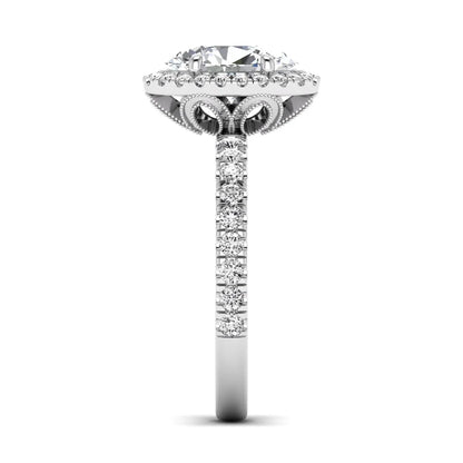 Oval cut lab grown diamond halo engagement ring with pavé round diamonds in a white gold setting