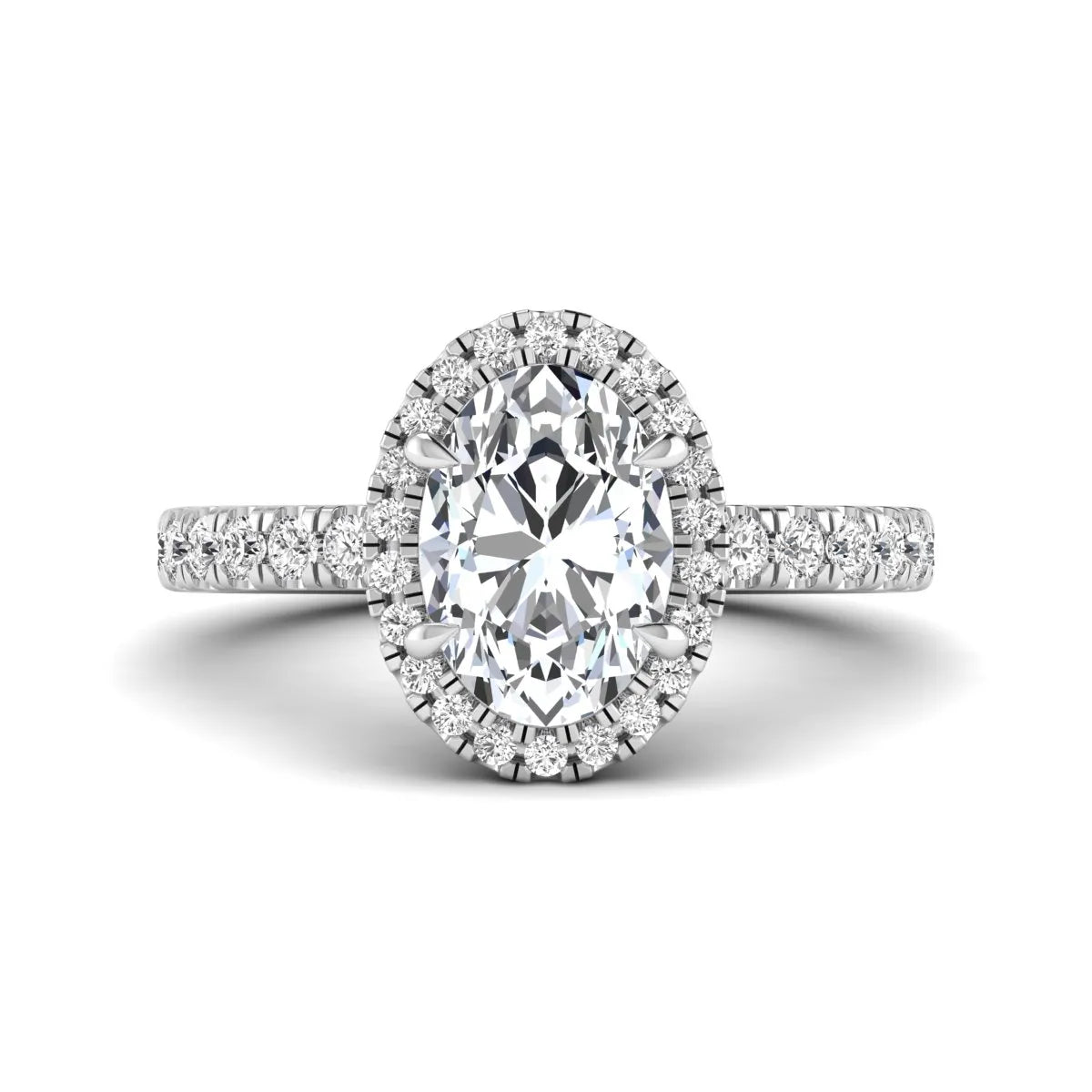Oval cut lab grown diamond halo engagement ring with pavé round diamonds in a white gold setting