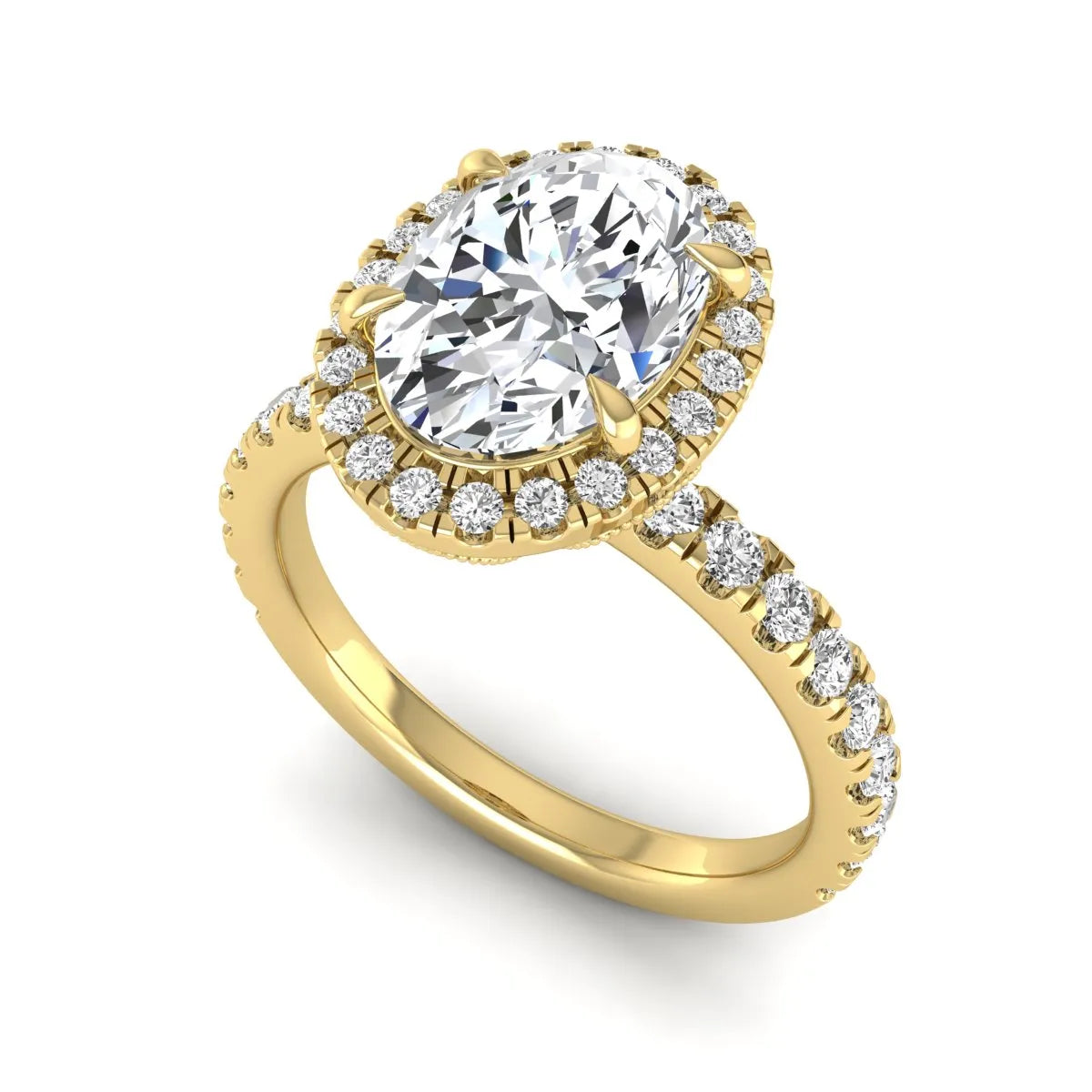 Oval cut lab grown diamond halo engagement ring with pavé round diamonds in a yellow gold setting
