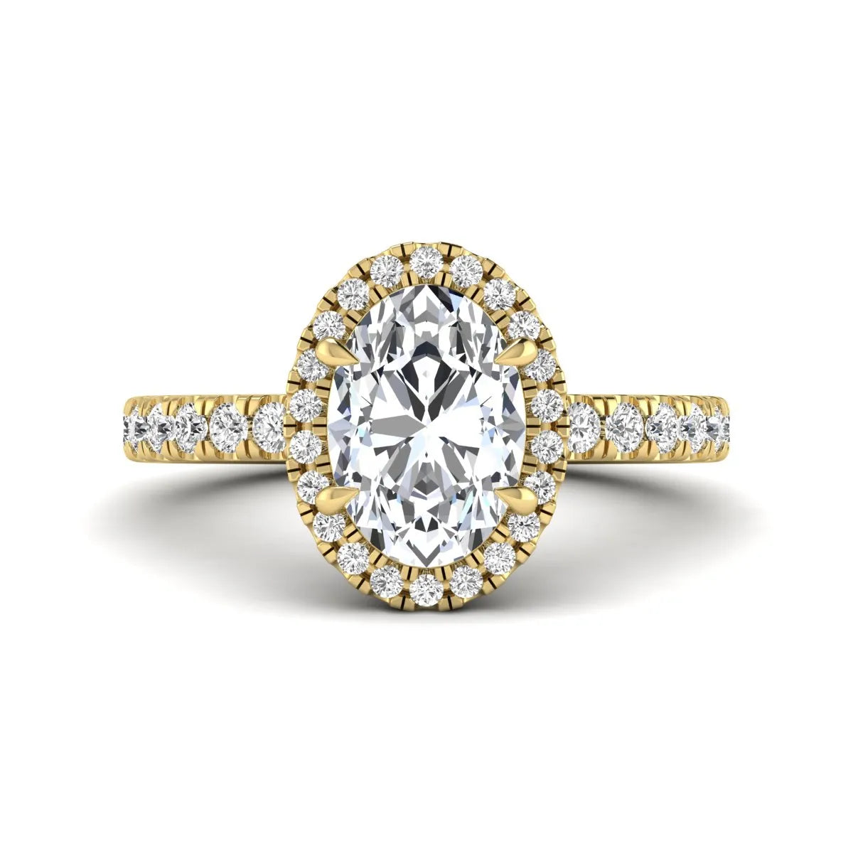 Oval cut lab grown diamond halo engagement ring with pavé round diamonds in a yellow gold setting