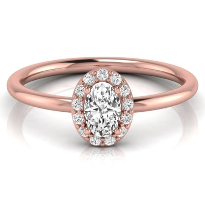 Oval halo lab grown diamond engagement ring featuring a 0.43 carat oval cut center diamond surrounded by round halo diamonds in a rose gold design.