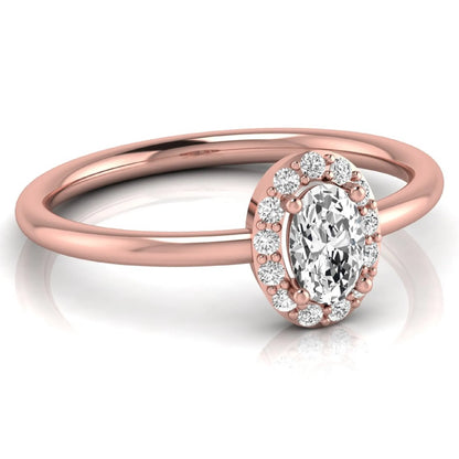 Oval halo lab grown diamond engagement ring featuring a 0.43 carat oval cut center diamond surrounded by round halo diamonds in a rose gold design.