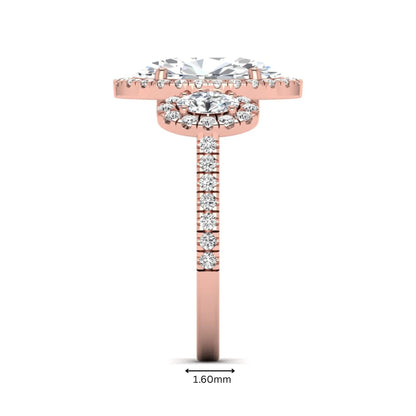 Oval cut lab grown diamond three stone engagement ring featuring a halo center, halo oval side diamonds, pavé shoulders, and a polished rose gold tone band.