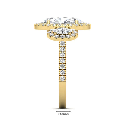 Oval cut lab grown diamond three stone engagement ring featuring a halo center, halo oval side diamonds, pavé shoulders, and a polished yellow gold tone band.