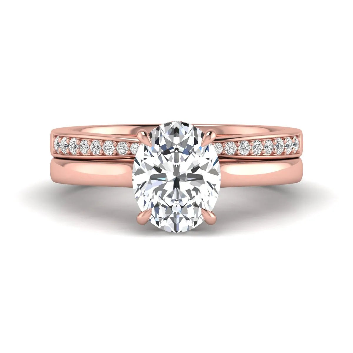 IGI Certified 2.54 carat oval cut lab grown diamond hidden halo bridal ring set with matching diamond wedding band in rose gold.
