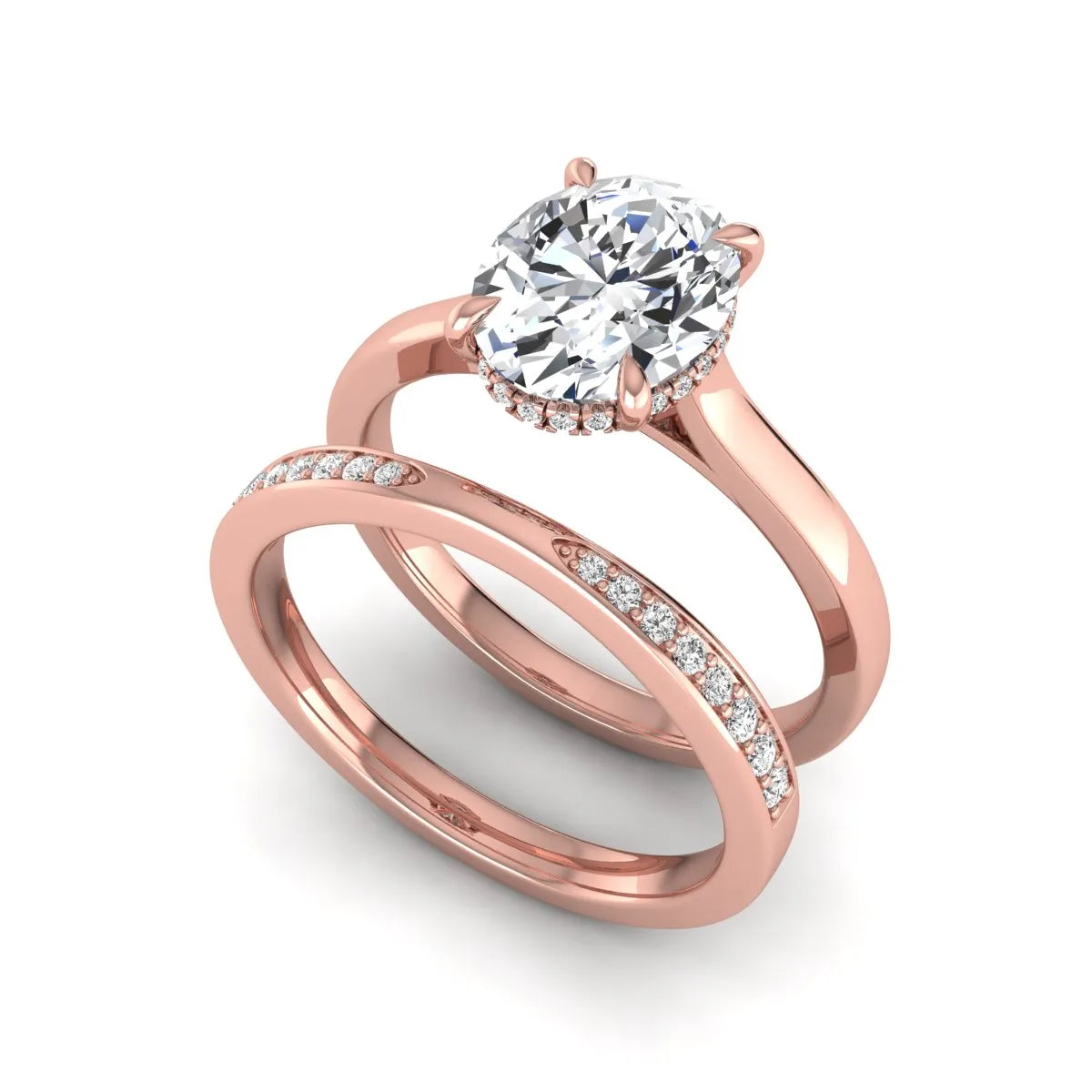 IGI Certified 2.54 carat oval cut lab grown diamond hidden halo bridal ring set with matching diamond wedding band in rose gold.