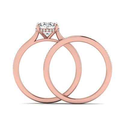 IGI Certified 2.54 carat oval cut lab grown diamond hidden halo bridal ring set with matching diamond wedding band in rose gold.