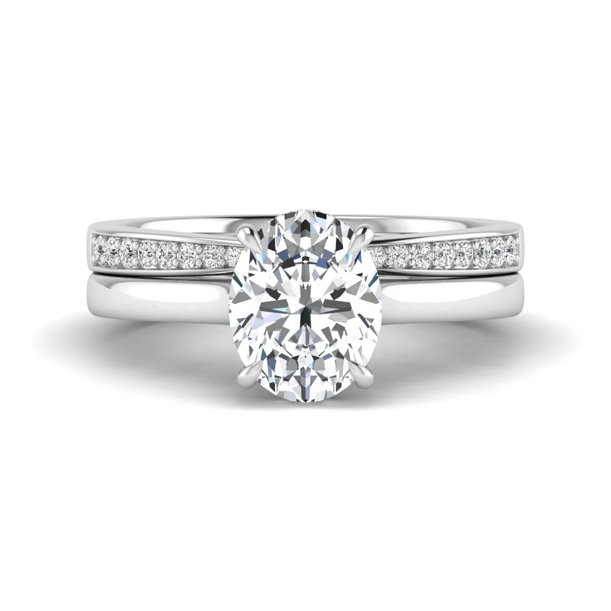 IGI Certified 2.54 carat oval cut lab grown diamond hidden halo bridal ring set with matching diamond wedding band in white gold.