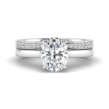 IGI Certified 2.54 carat oval cut lab grown diamond hidden halo bridal ring set with matching diamond wedding band in white gold.