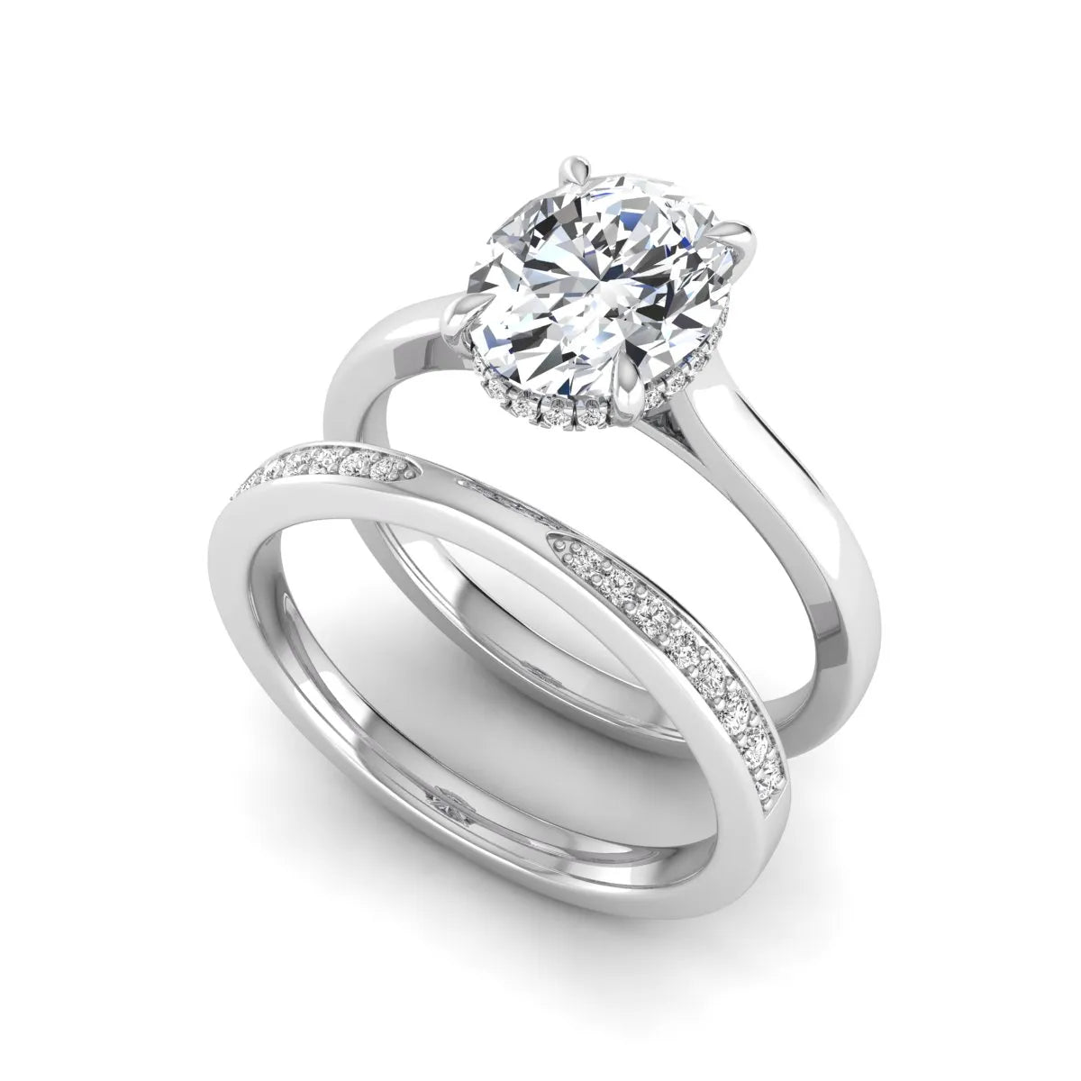 IGI Certified 2.54 carat oval cut lab grown diamond hidden halo bridal ring set with matching diamond wedding band in white gold.