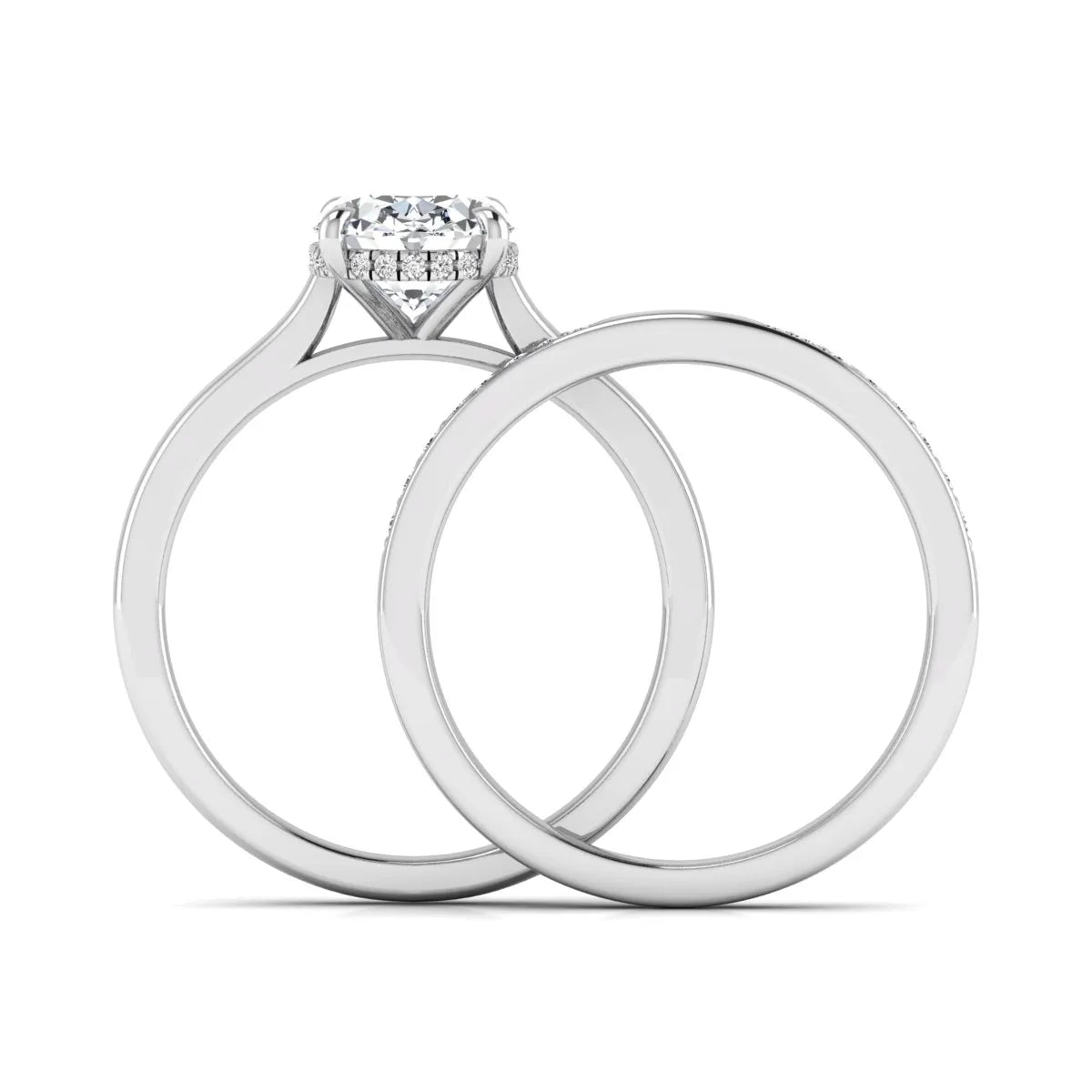 IGI Certified 2.54 carat oval cut lab grown diamond hidden halo bridal ring set with matching diamond wedding band in white gold.