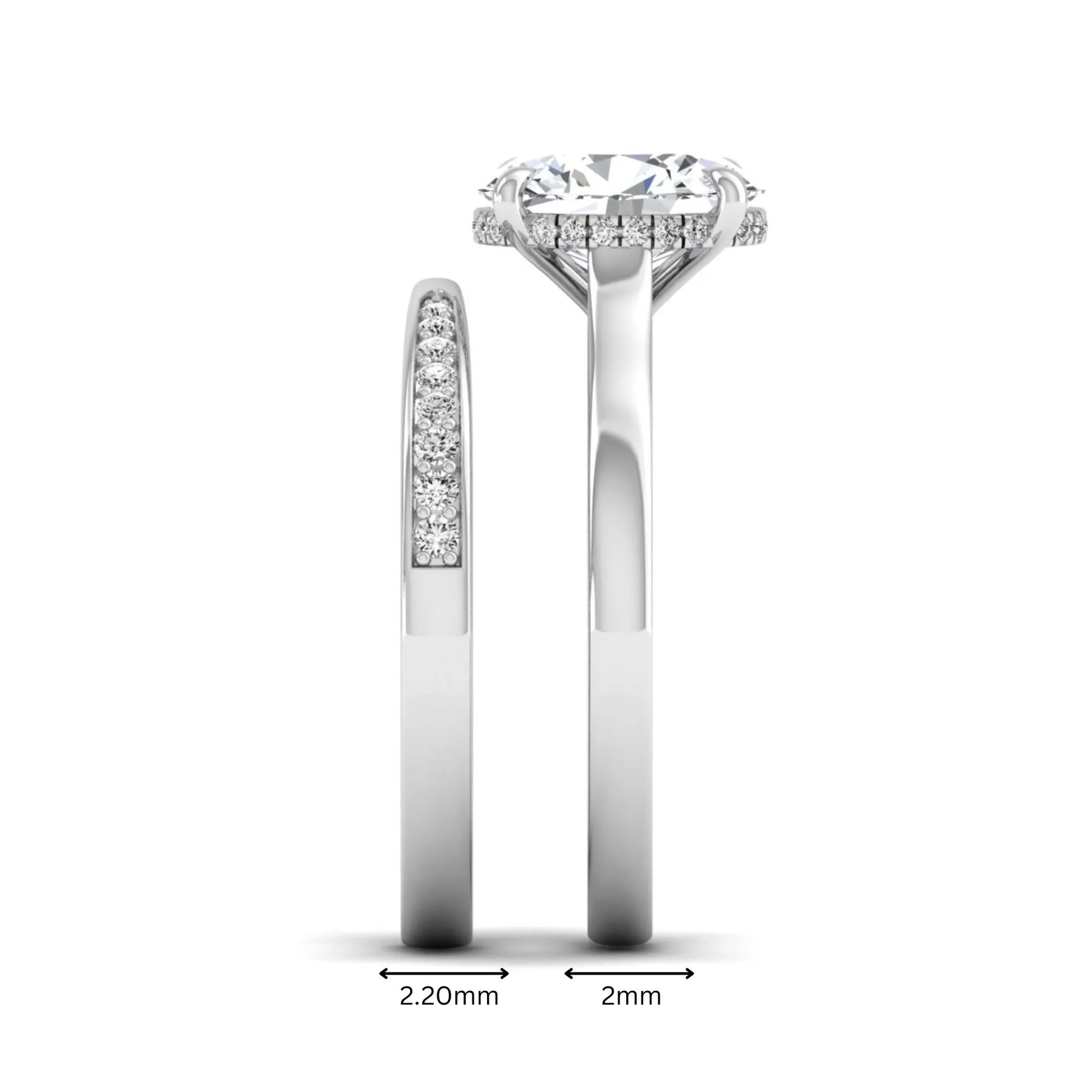 IGI Certified 2.54 carat oval cut lab grown diamond hidden halo bridal ring set with matching diamond wedding band in white gold.