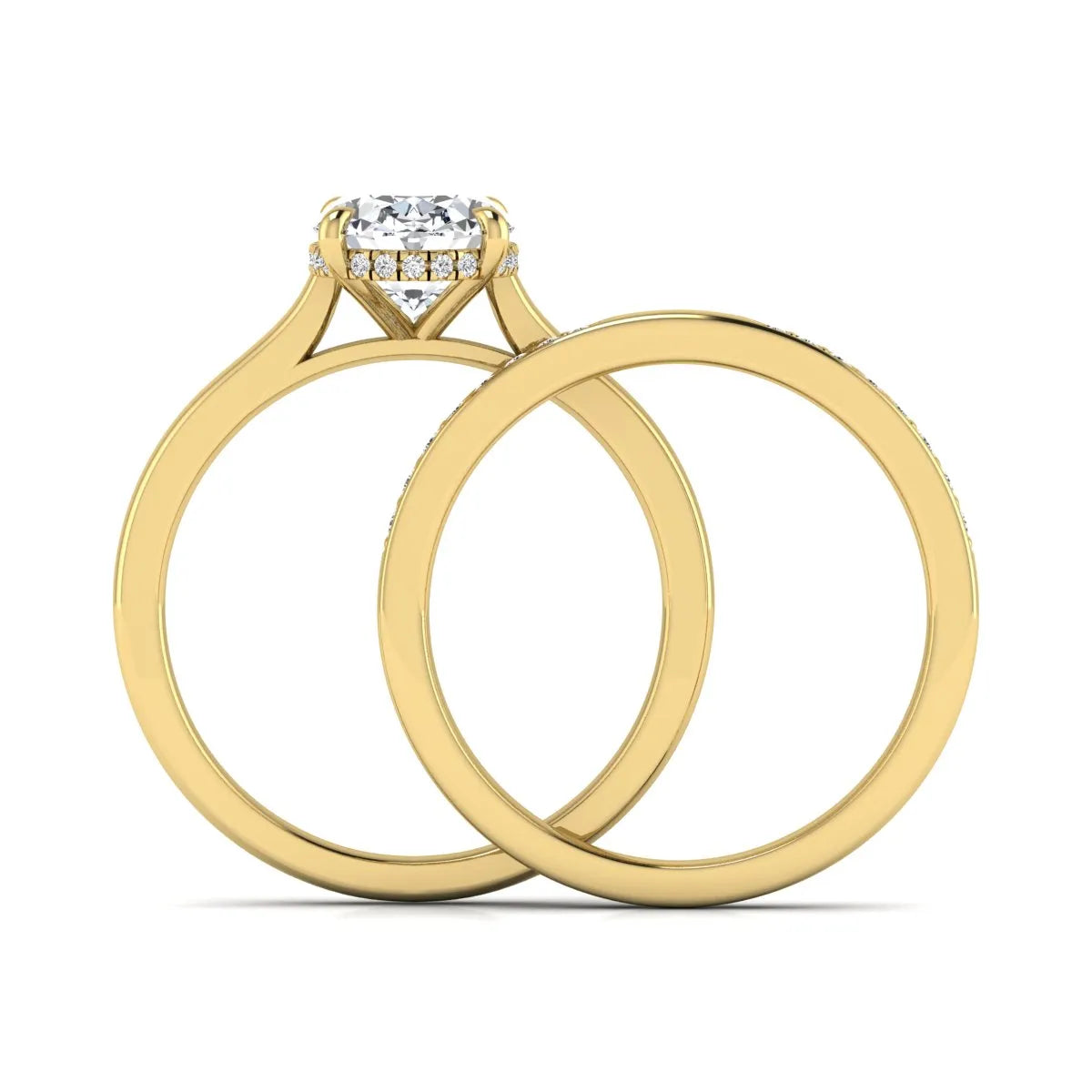 IGI Certified 2.54 carat oval cut lab grown diamond hidden halo bridal ring set with matching diamond wedding band in yellow gold.