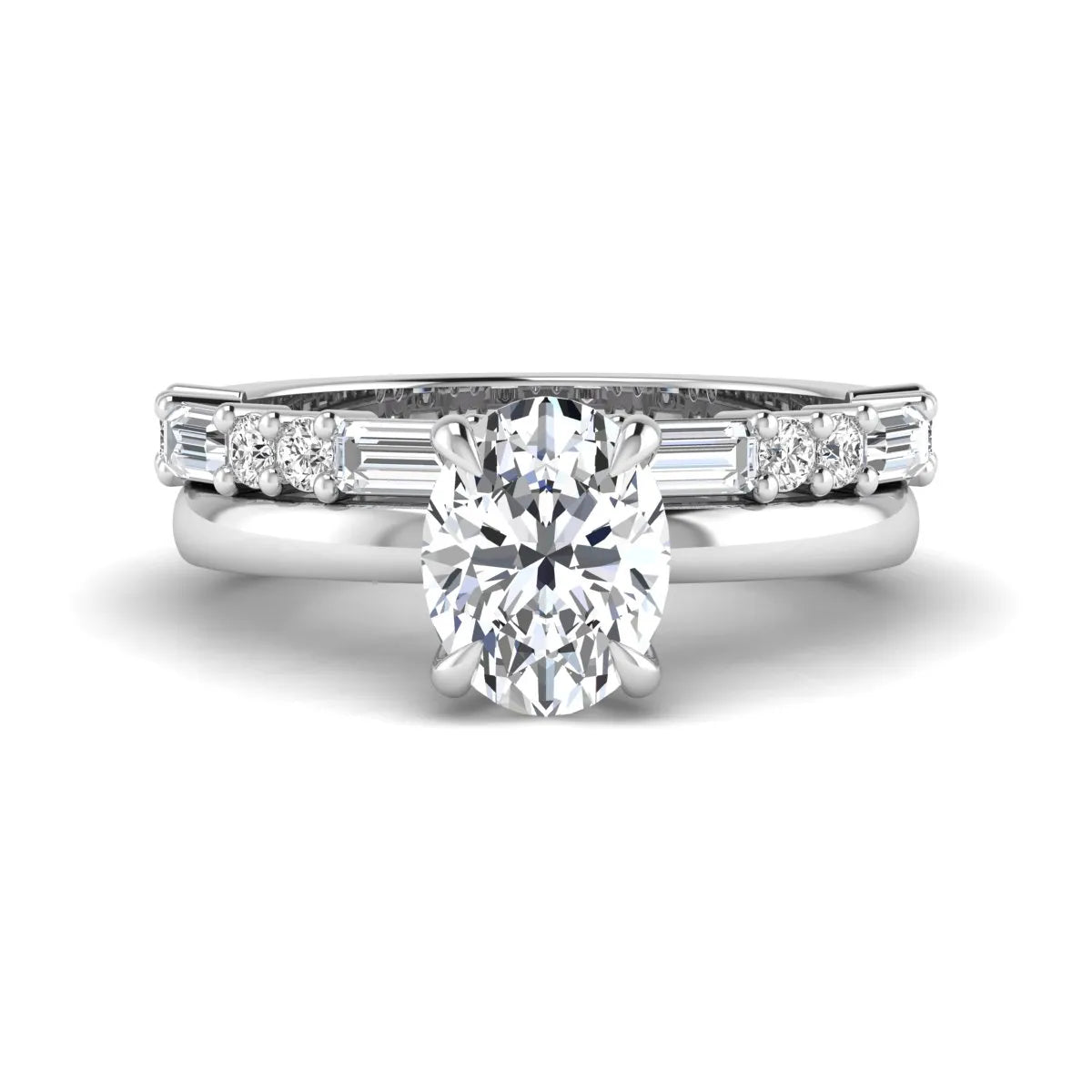 Oval cut lab grown diamond hidden halo bridal ring set featuring baguette and round side diamonds in white gold tone design.