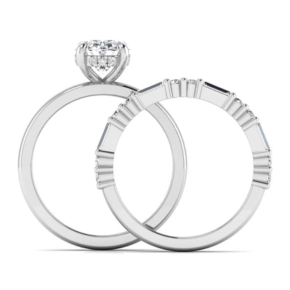 Oval cut lab grown diamond hidden halo bridal ring set featuring baguette and round side diamonds in white gold tone design.