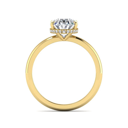 Oval cut hidden halo lab grown diamond engagement ring featuring a 2.99 carat IGI certified center diamond with round hidden halo accents in yellow gold.
