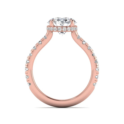 Oval cut lab grown diamond hidden halo engagement ring with pavé band and four-prong setting in a rose gold tone design.
