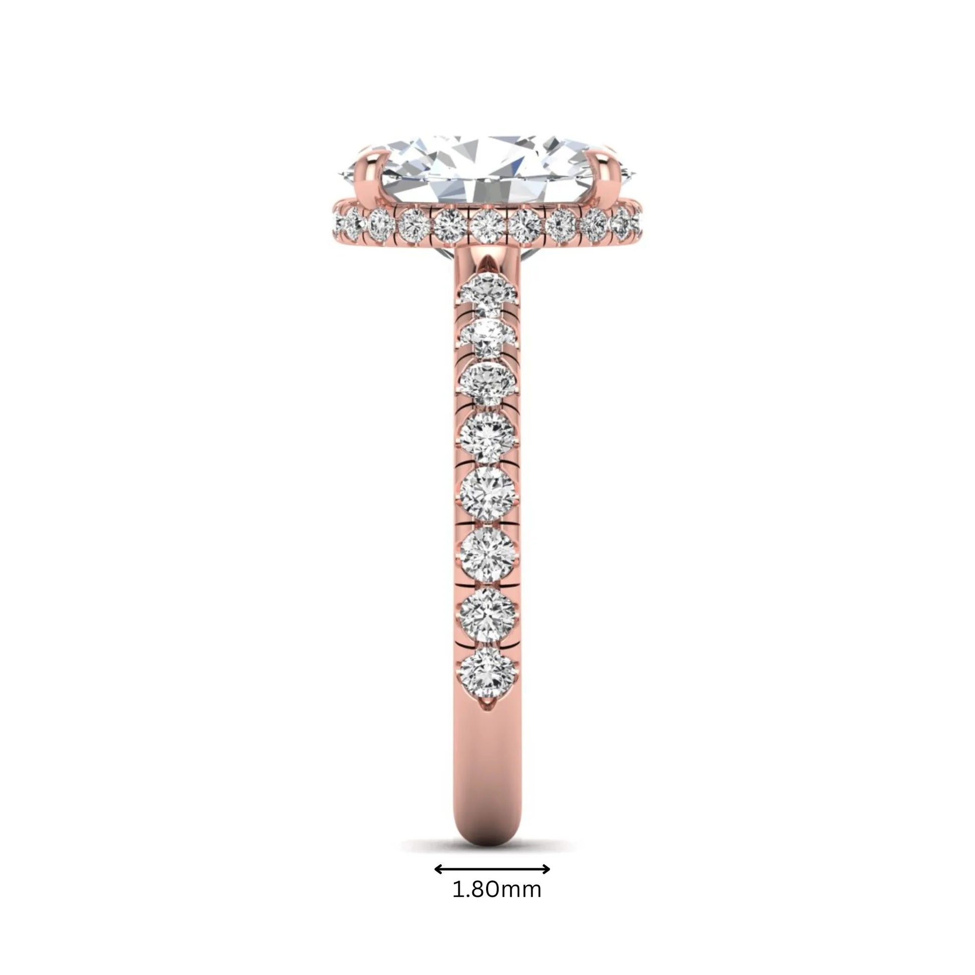 Oval cut lab grown diamond hidden halo engagement ring with pavé band and four-prong setting in a rose gold tone design.