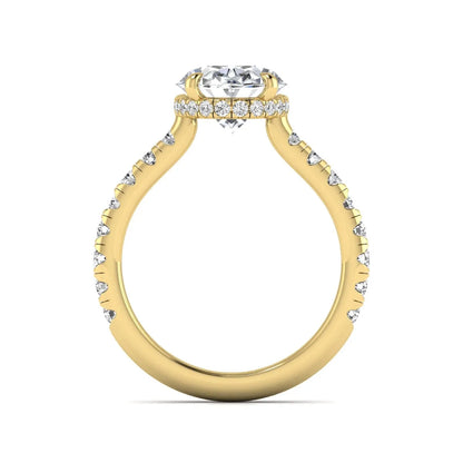 Oval cut lab grown diamond hidden halo engagement ring with pavé band and four-prong setting in a yellow gold tone design.
