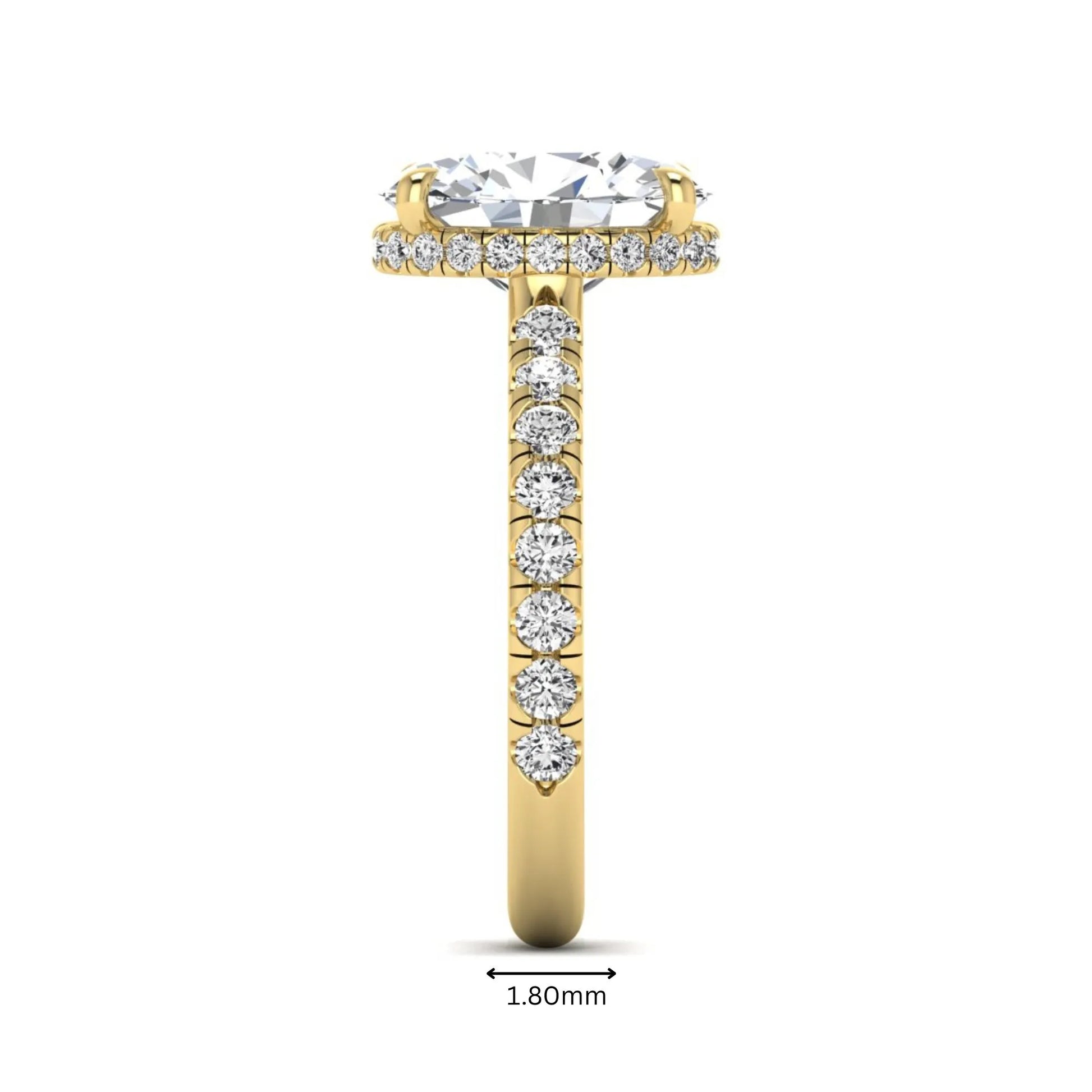 Oval cut lab grown diamond hidden halo engagement ring with pavé band and four-prong setting in a yellow gold tone design.