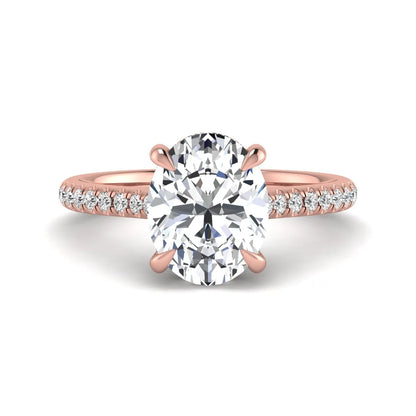 IGI Certified 2.54 carat oval cut lab grown diamond hidden halo pavé engagement ring with round accent diamonds in rose gold.