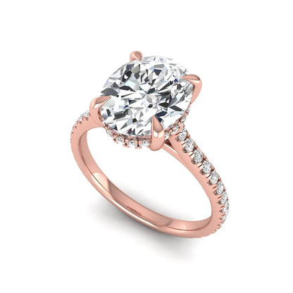 IGI Certified 2.54 carat oval cut lab grown diamond hidden halo pavé engagement ring with round accent diamonds in rose gold.