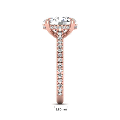 IGI Certified 2.54 carat oval cut lab grown diamond hidden halo pavé engagement ring with round accent diamonds in rose gold.