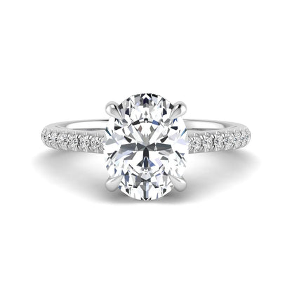 IGI Certified 2.54 carat oval cut lab grown diamond hidden halo pavé engagement ring with round accent diamonds in white gold.