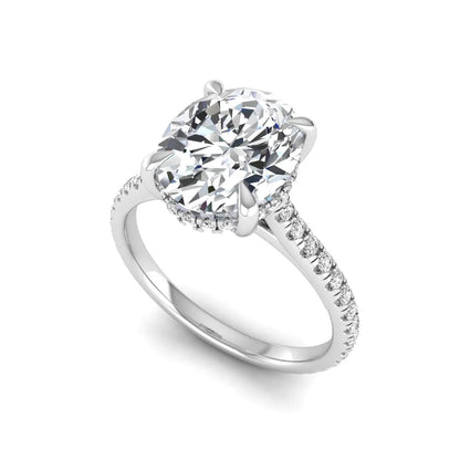 IGI Certified 2.54 carat oval cut lab grown diamond hidden halo pavé engagement ring with round accent diamonds in white gold.