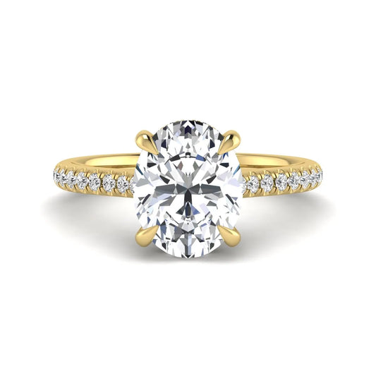 IGI Certified 2.54 carat oval cut lab grown diamond hidden halo pavé engagement ring with round accent diamonds in yellow gold.