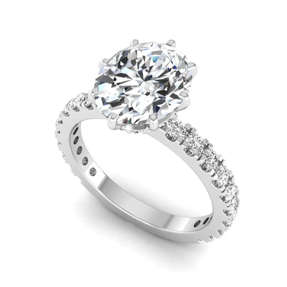 Oval Hidden Halo Pavé Lab Grown Diamond Engagement Ring featuring a 10.00 × 8.00 mm oval-cut center diamond with a hidden halo, pavé diamond band, and four-prong setting in white gold