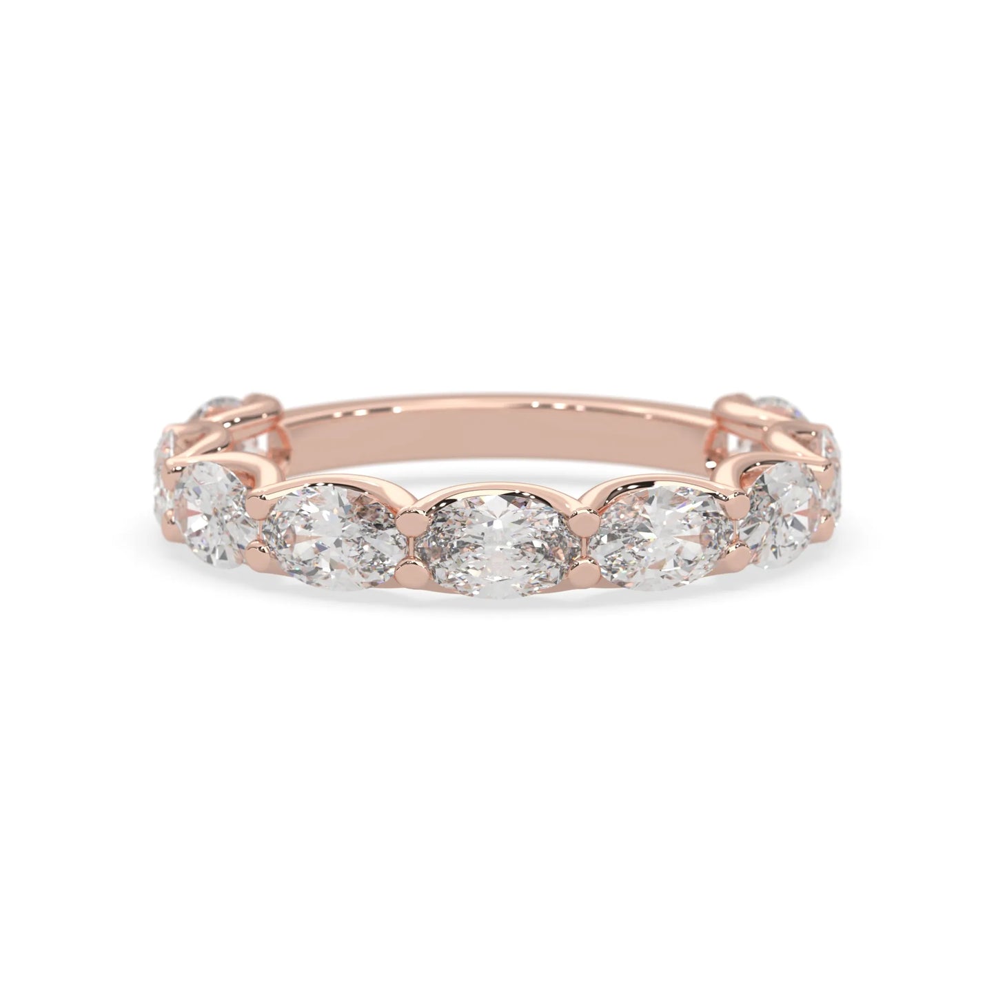 Oval lab grown diamond half eternity wedding band in a selected metal color with shared prong setting in rose gold
