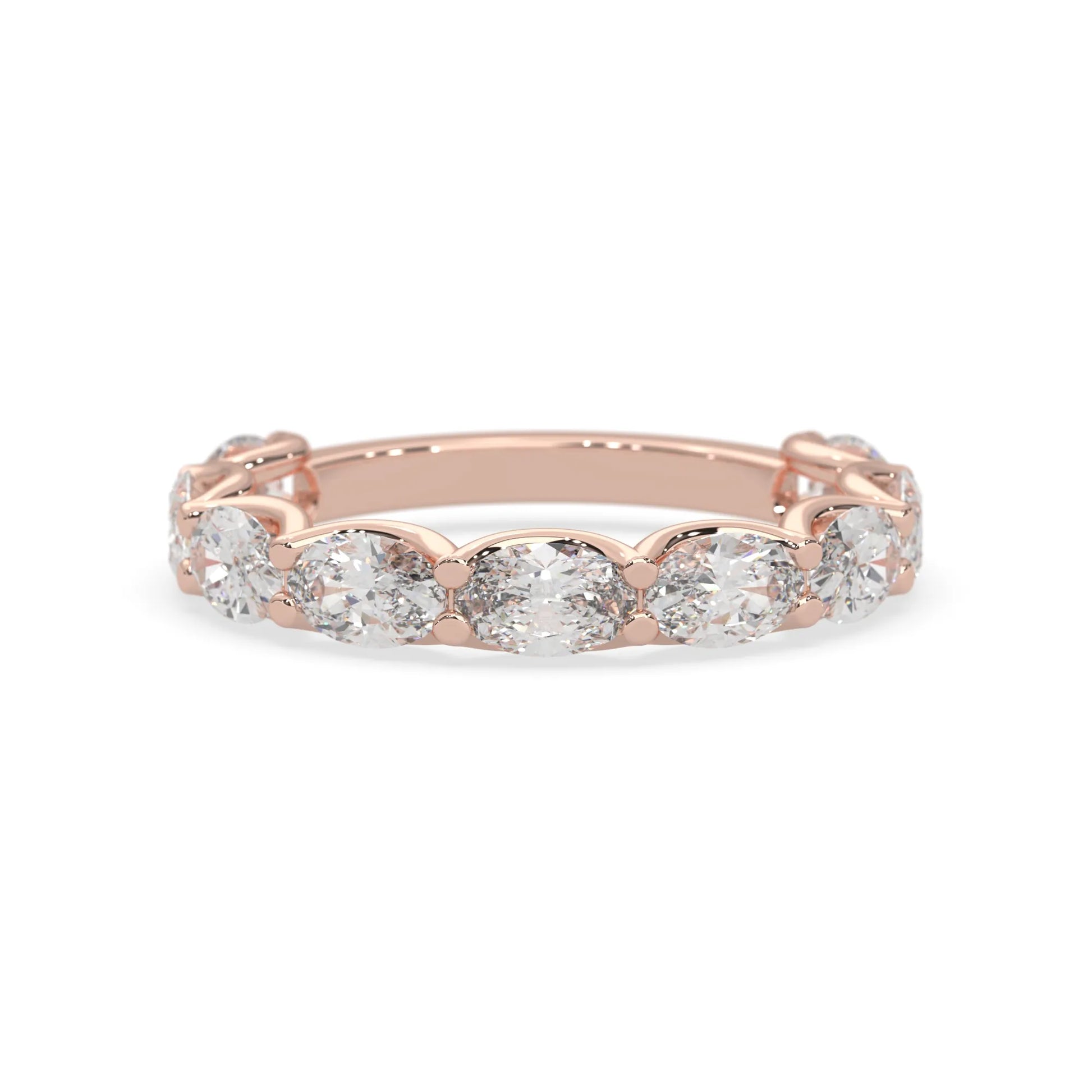 Oval lab grown diamond half eternity wedding band in a selected metal color with shared prong setting in rose gold