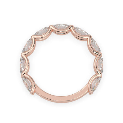 Oval lab grown diamond half eternity wedding band in a selected metal color with shared prong setting in rose gold