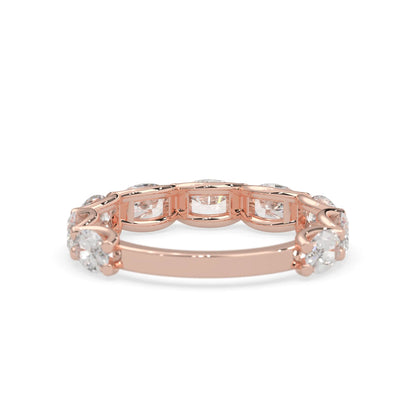 Oval lab grown diamond half eternity wedding band in a selected metal color with shared prong setting in rose gold