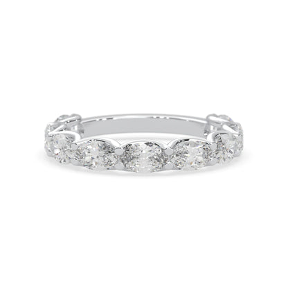 Oval lab grown diamond half eternity wedding band in a selected metal color with shared prong setting in white gold