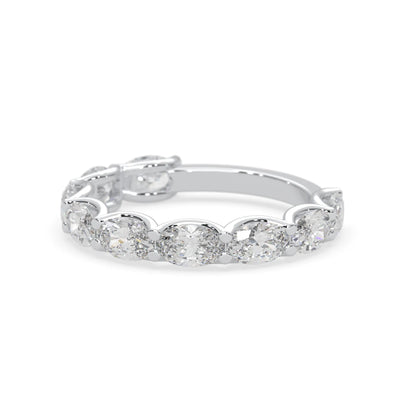 Oval lab grown diamond half eternity wedding band in a selected metal color with shared prong setting in white gold
