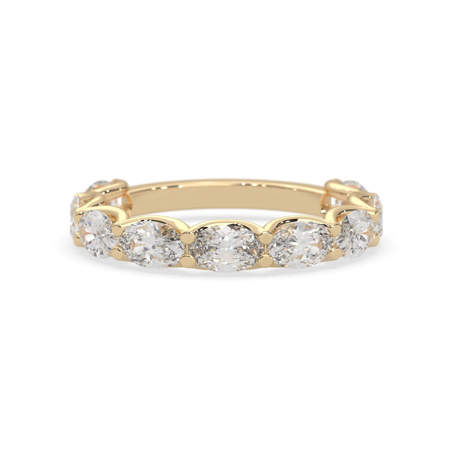 Oval lab grown diamond half eternity wedding band in a selected metal color with shared prong setting in yellow gold