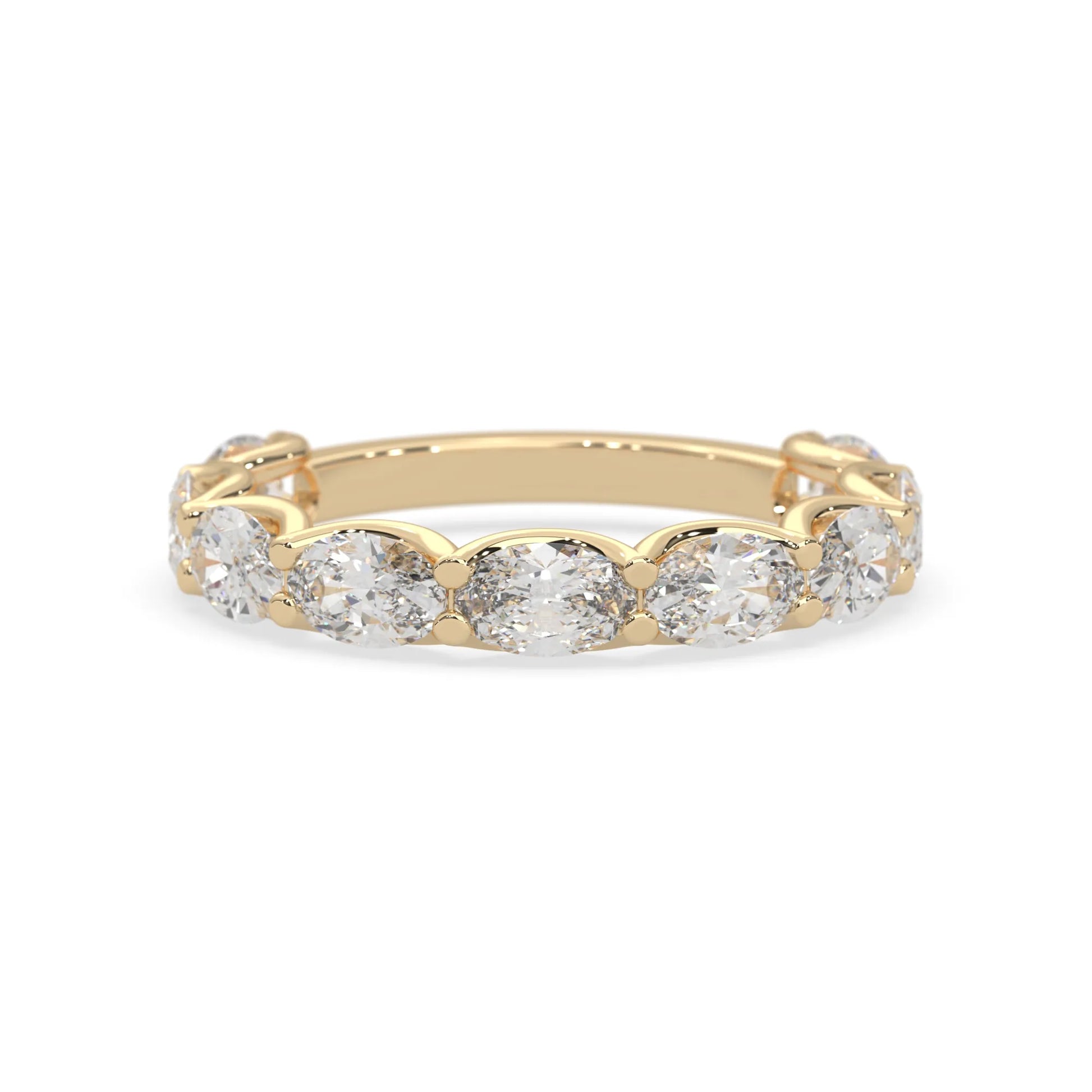 Oval lab grown diamond half eternity wedding band in a selected metal color with shared prong setting in yellow gold