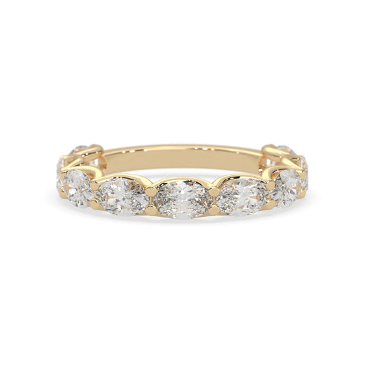 Oval lab grown diamond half eternity wedding band in a selected metal color with shared prong setting in yellow gold