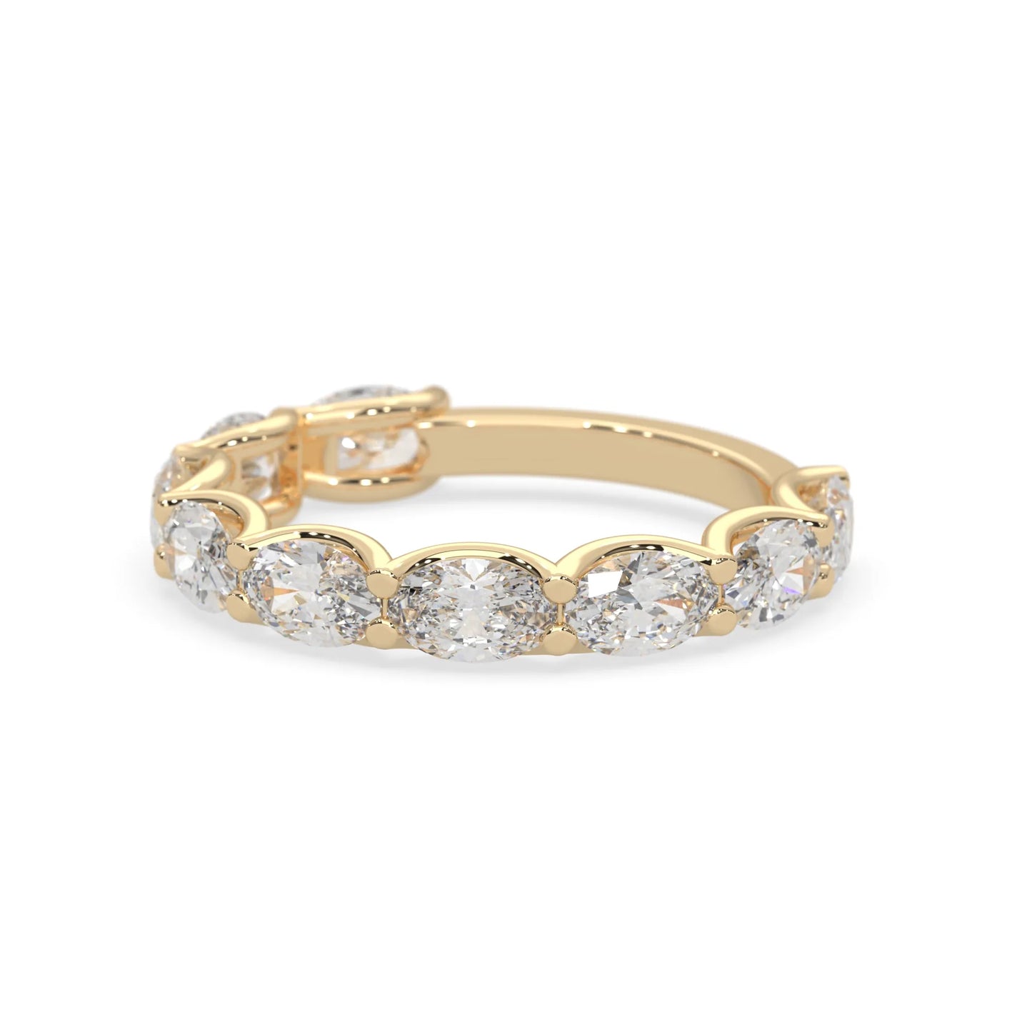 Oval lab grown diamond half eternity wedding band in a selected metal color with shared prong setting in yellow gold