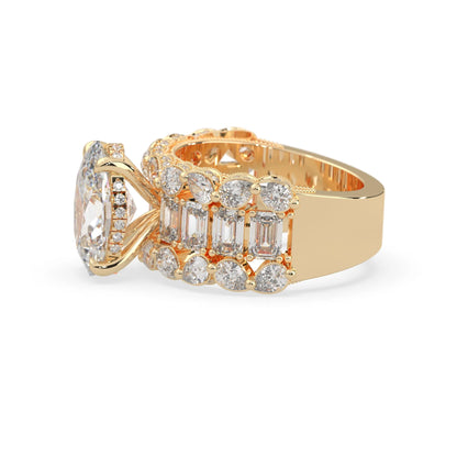 Oval lab grown diamond cocktail ring with emerald, round, and pear diamond accents in yellow gold